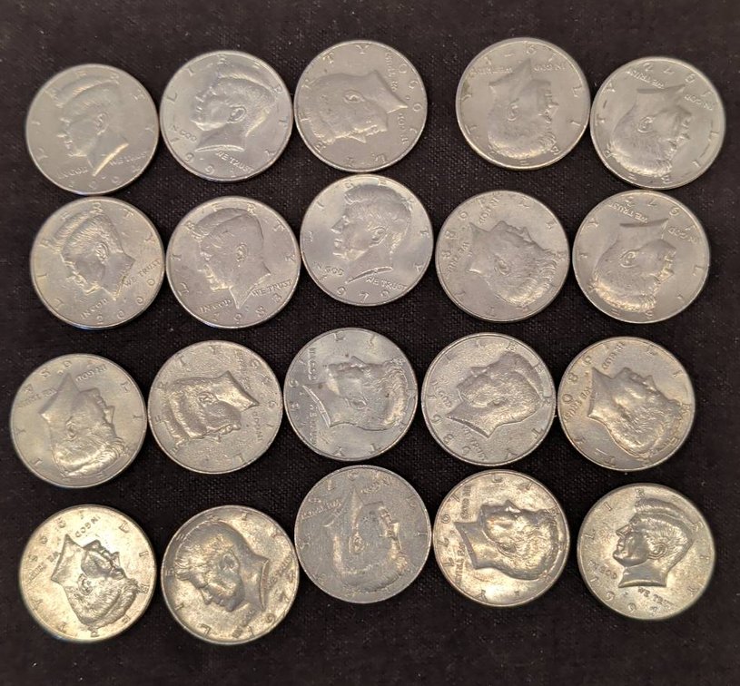18 different date Kennedy Half Dollar Coins