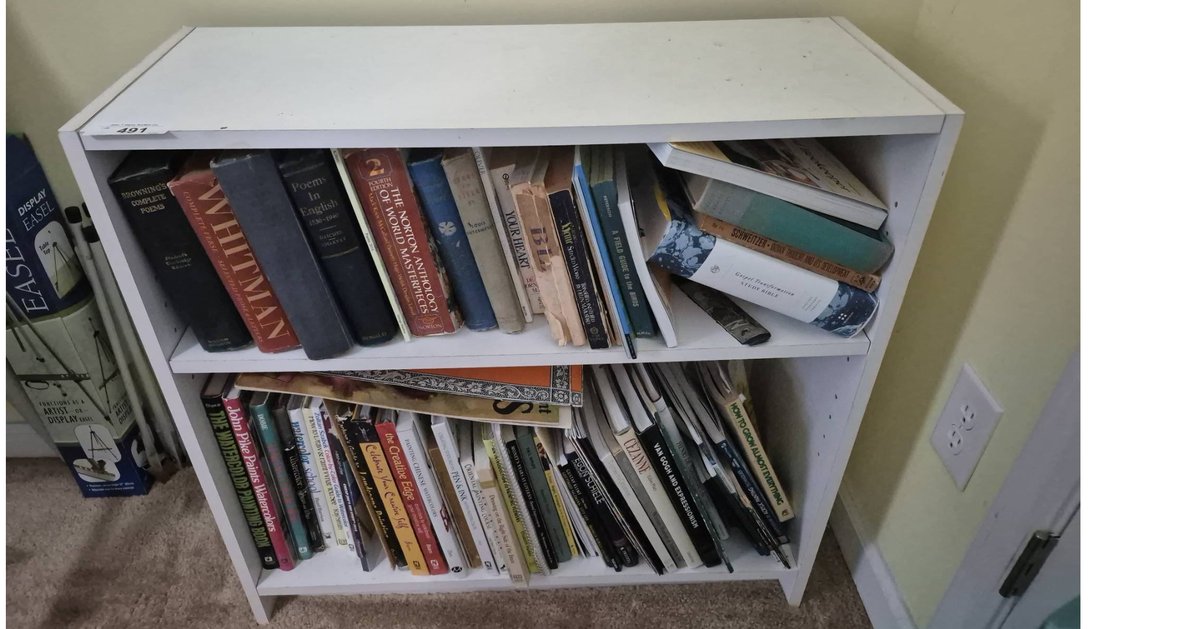 White Bookshelf With Assorted Books