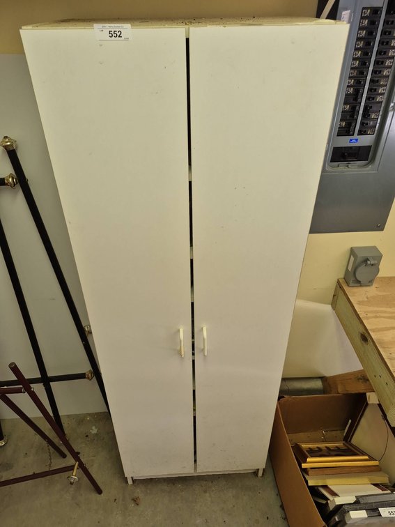 White Metal Storage Cabinet With Contents