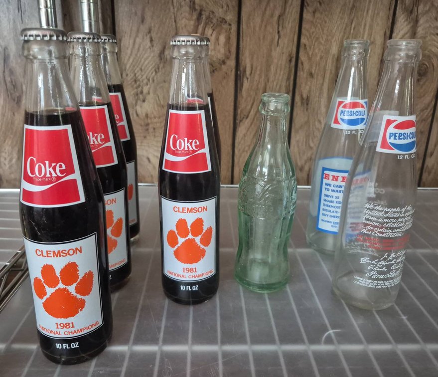 202 - Coke Clemson 1981 Bottles & Pepsi/Coke Bottles Lot