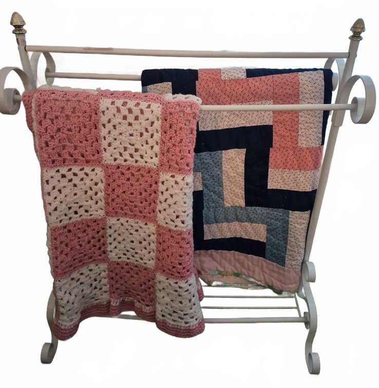 218 - White Metal Quilt Rack With Two Quilts 30x16x35