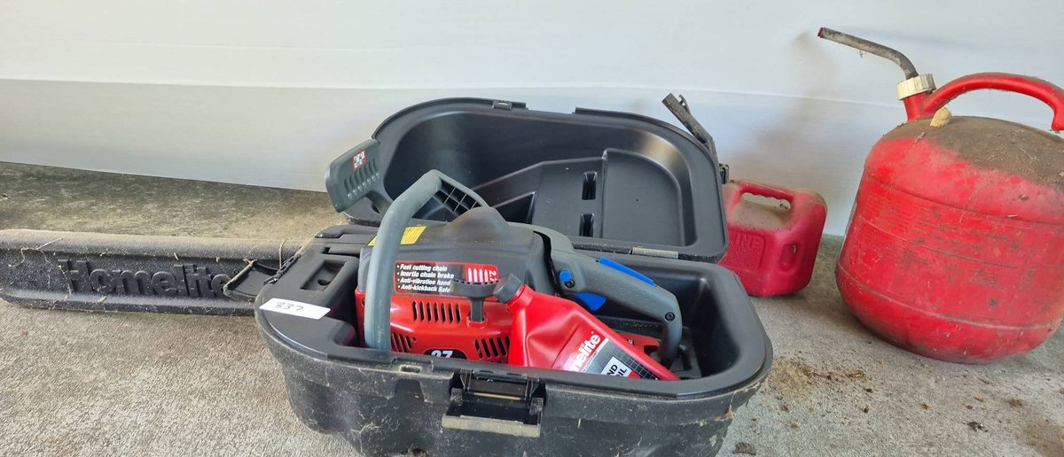337 - Homelite Chainsaw With Case and Fuel Cans