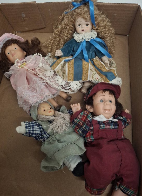 4 Porcelain and Cloth Dolls Assorted