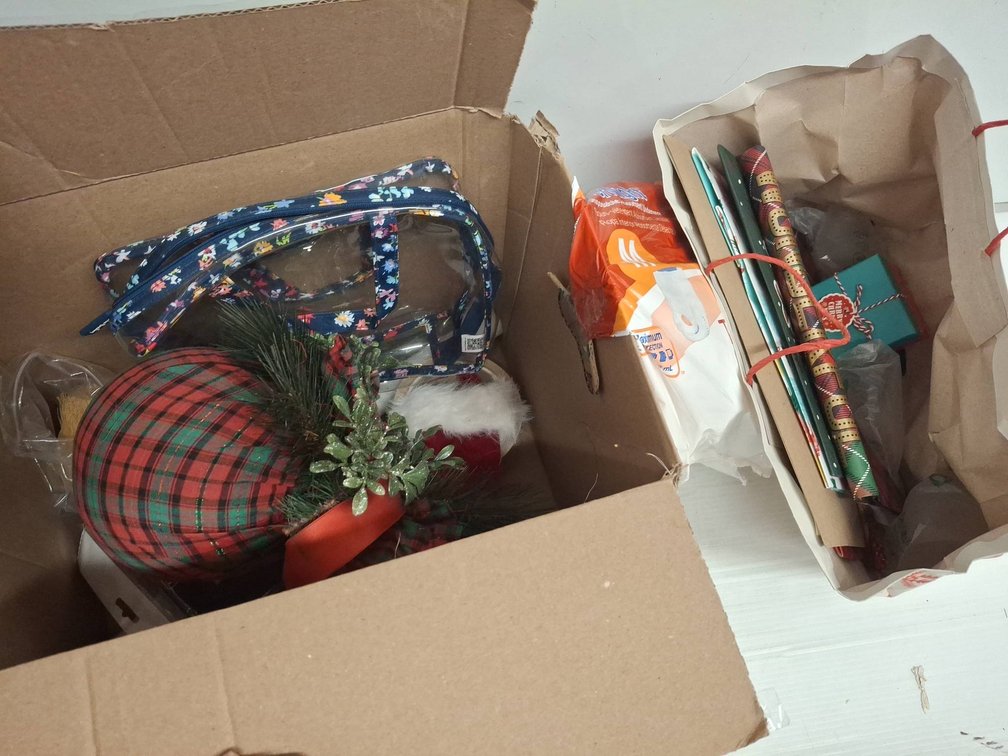 Box Lot: Gift Wrap, Glue Trap, Clear Bag & More