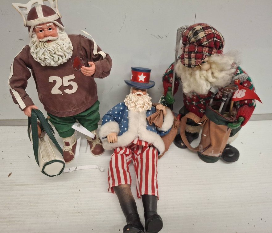 Three Themed Santa Claus Figurines Assortment