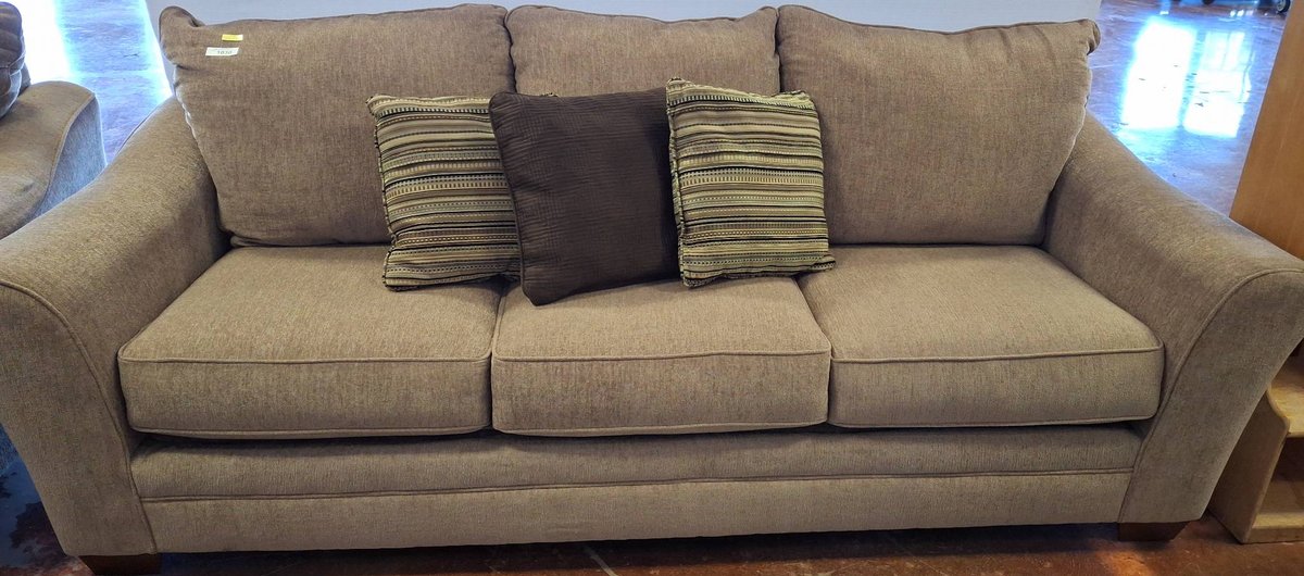 Ashley Furniture 100" Beige Sofa with Pillows