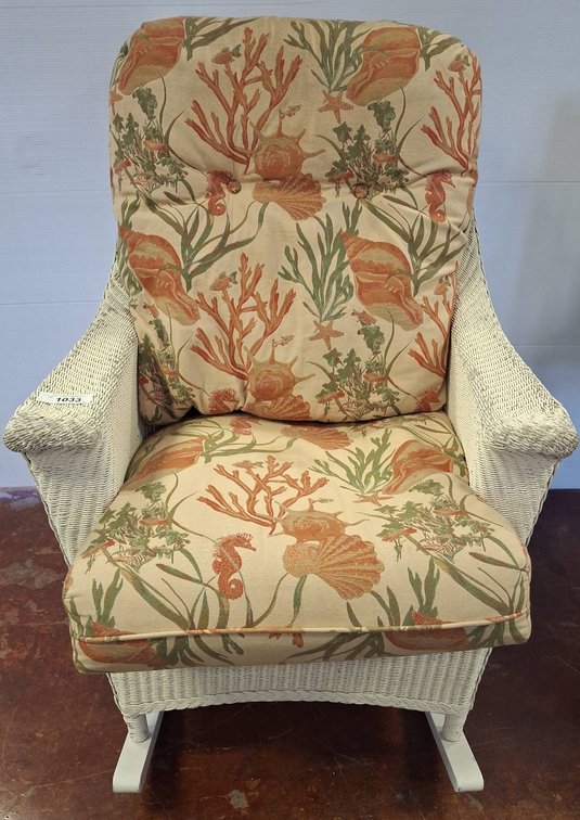 White Wicker Rocking Chair With Floral Cushions