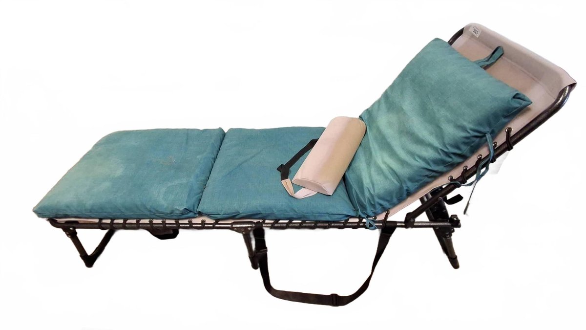 Folding Metal Cot With Blue Cushions