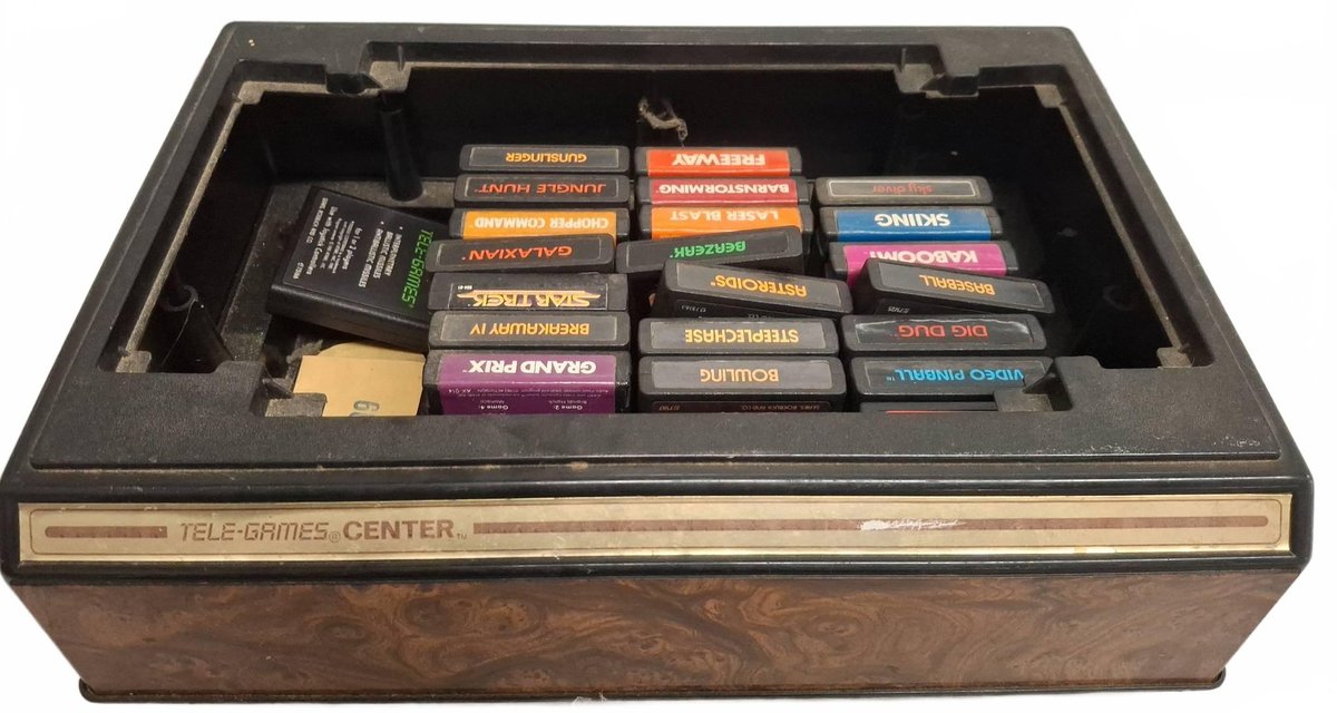 Tele-Games Center With Atari Game Cartridges