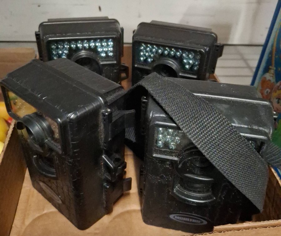 4 Moultrie MFH-DGS-M80 Game Cameras