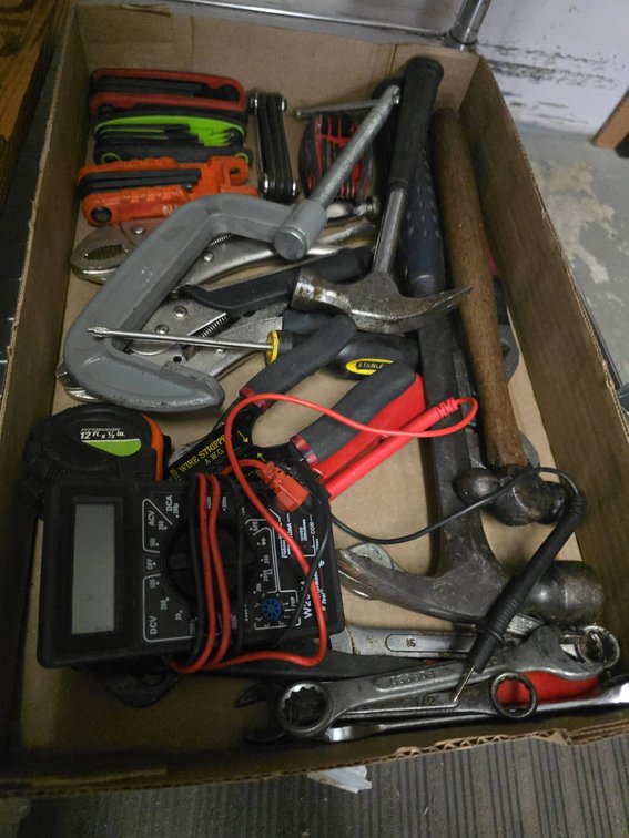 Hand Tools With Multimeter And Hammers