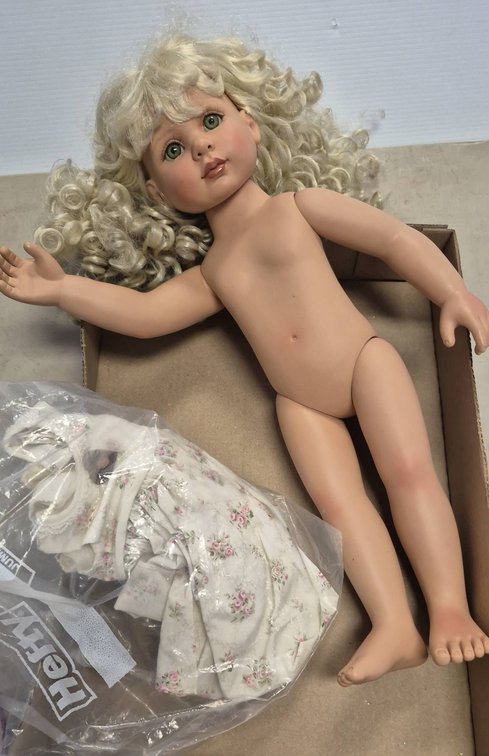 Blonde Porcelain Doll With Floral Dress