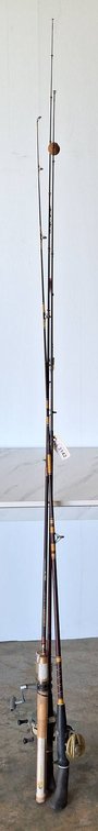 Three Fishing Rods With Reels