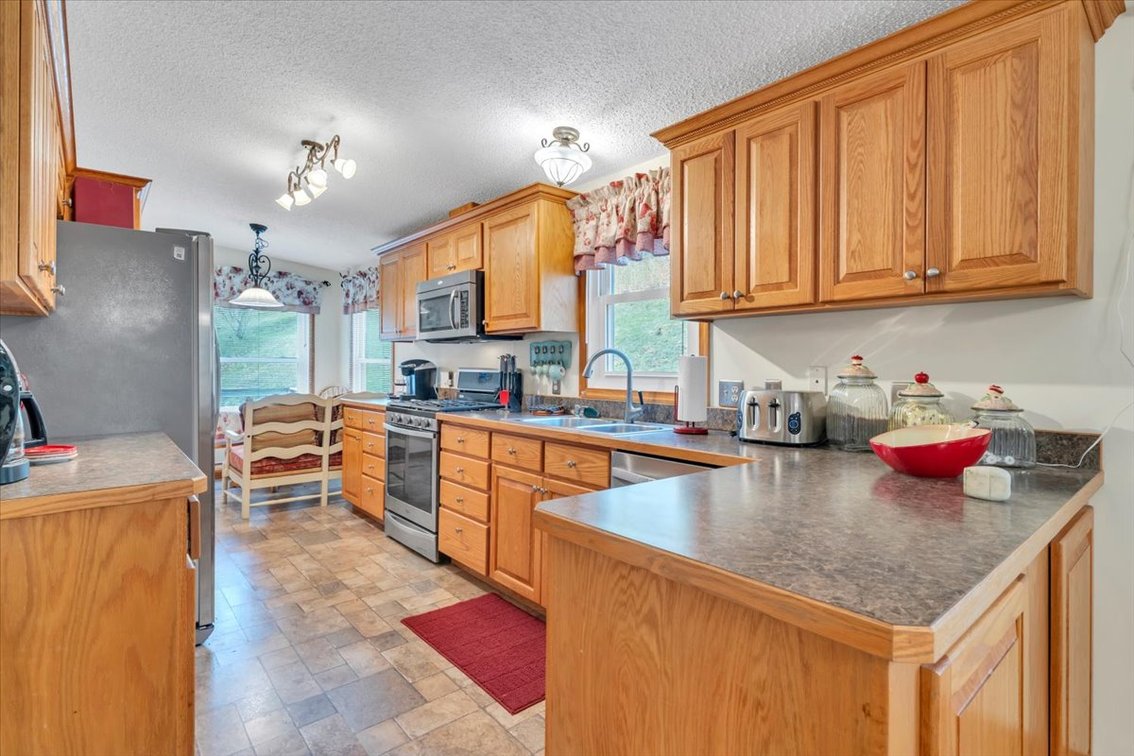 Image for For Sale | 4 Parcels Totaling 65± AC with Multiple Houses, Horse Stalls & Garages | 30 Minutes to Lynchburg | Ideal for Farming, Hunting, Rental Use, or Multi-Generational Living | 1271 & 1275 Tall Peaks Lane | Big Island, VA 24526