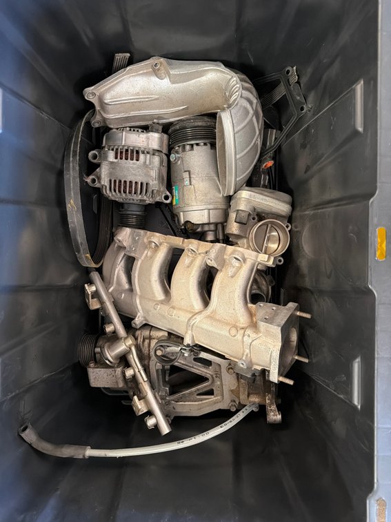 Automotive Engine Parts with A/C Compressor, Alternator, and Manifold