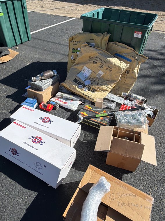 Automotive Parts Including Radiators, Exhaust Downpipe, and More