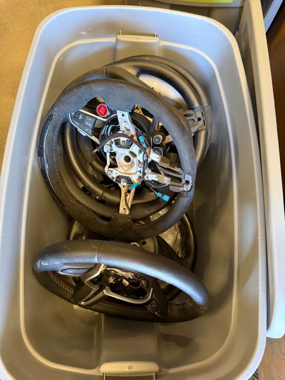Automotive Steering Wheels with Multifunction Controls