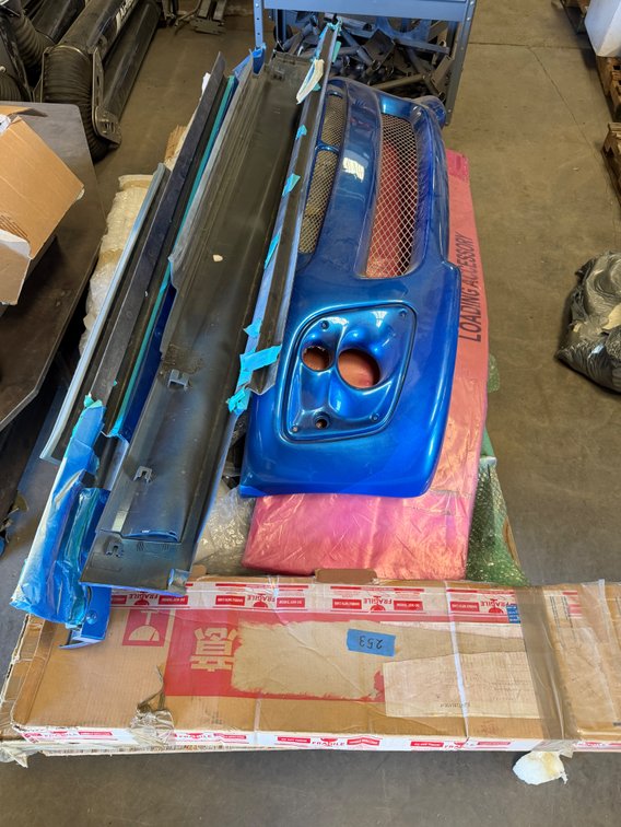 Metallic Blue Front Bumper Cover and Side Skirt Panels