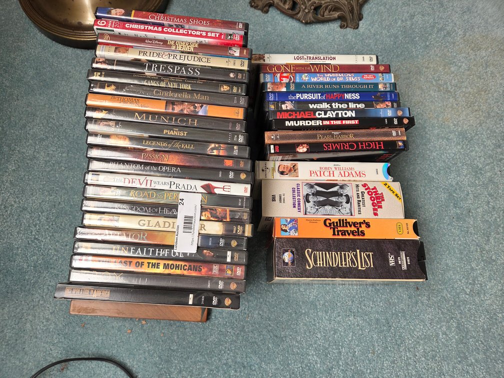 Variety of DVDs and VHS Tapes