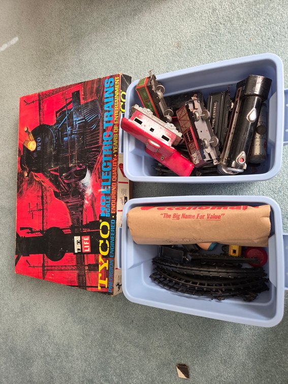 Vintage Tin Toy Train and a Tyco HO Scale Electric Train