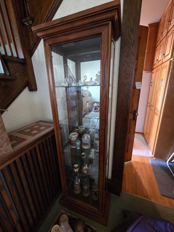 Curio Cabinet W/ Beer Steins and Figurines