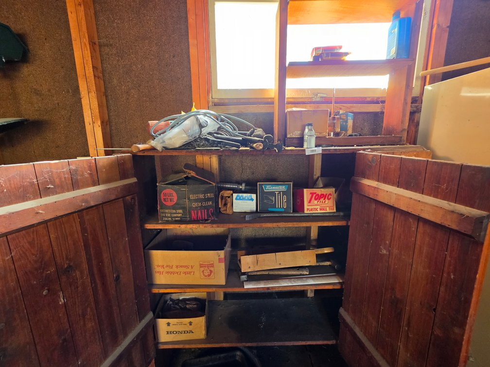 Contents of Cabinet and Shelf in Back of Garage