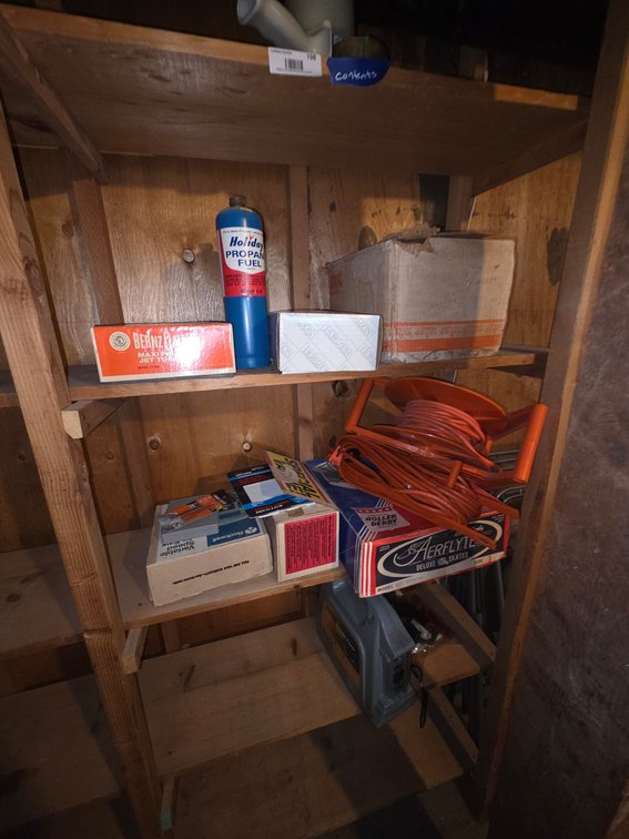 Contents of Shelf in Laundry Room & Folding Chairs