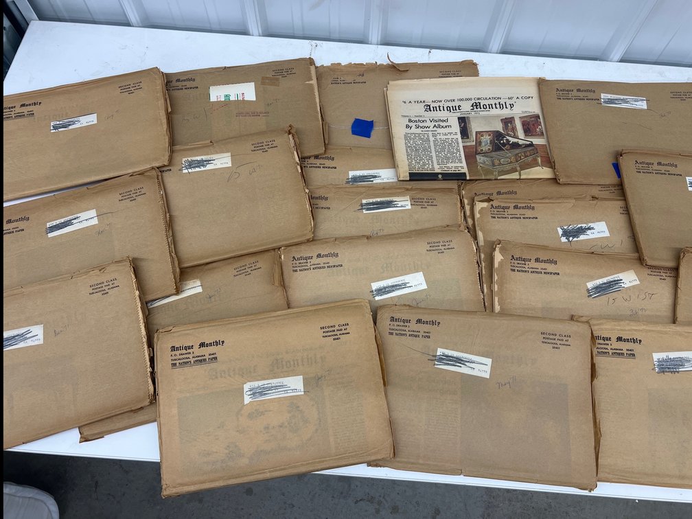 Stack of Antique Monthly Newspapers