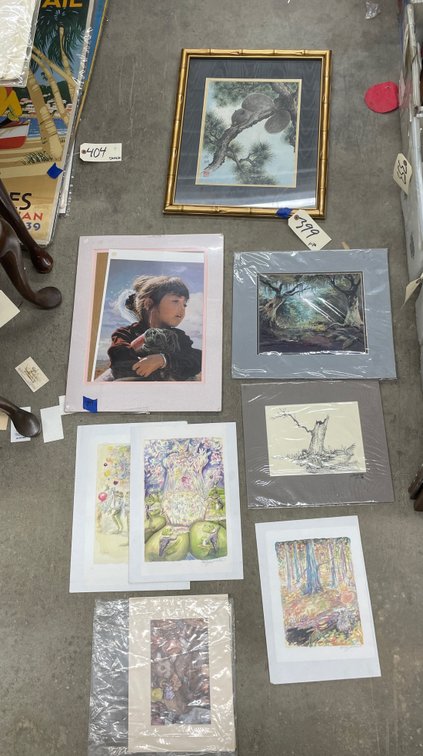 Stack of Assorted Prints - 1 is framed