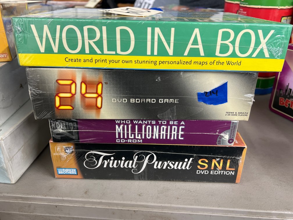 4 Assorted Board Games - World in a Box - 24 - Millionaire - Trivial