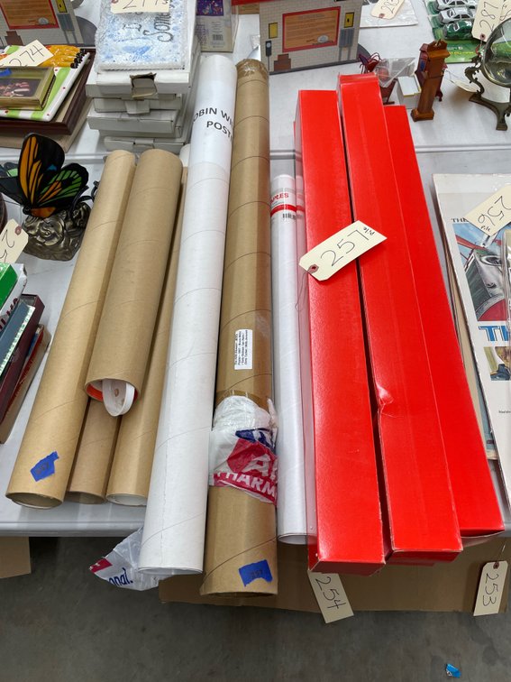 Stack of Assorted Posters & Poster Tubes