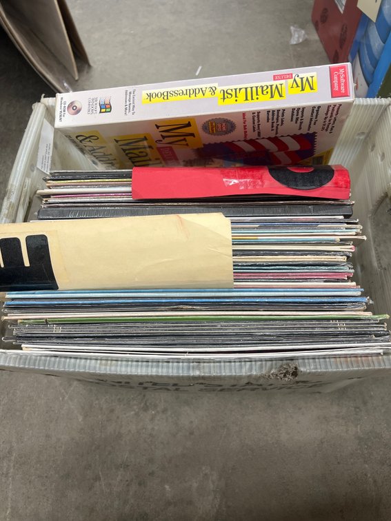Assorted Vinyl Records in Mail Tote