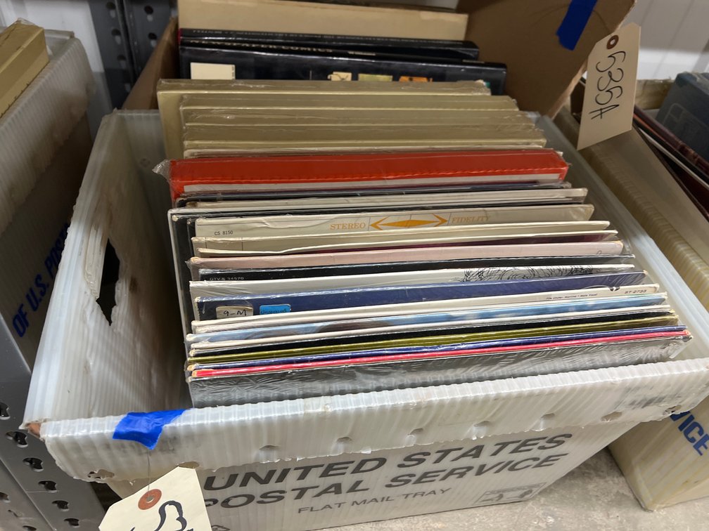 Assorted Vinyl Records in Mail Bin