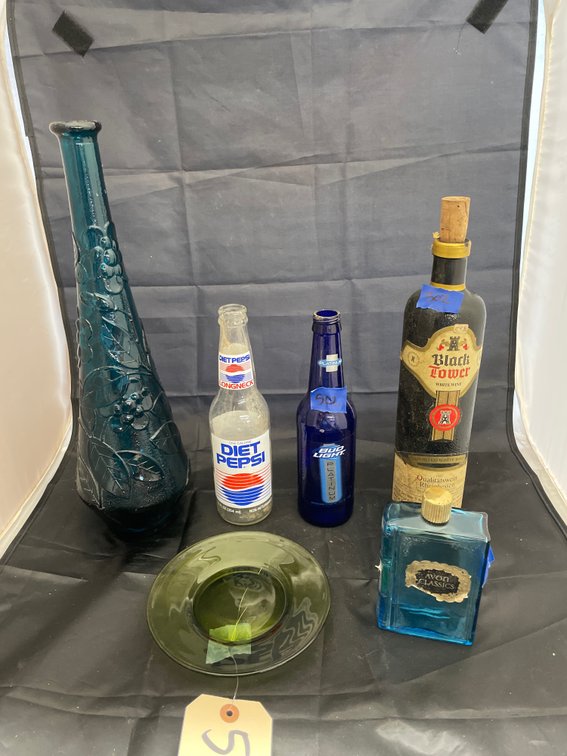 Assorted Bottles & Green Plate