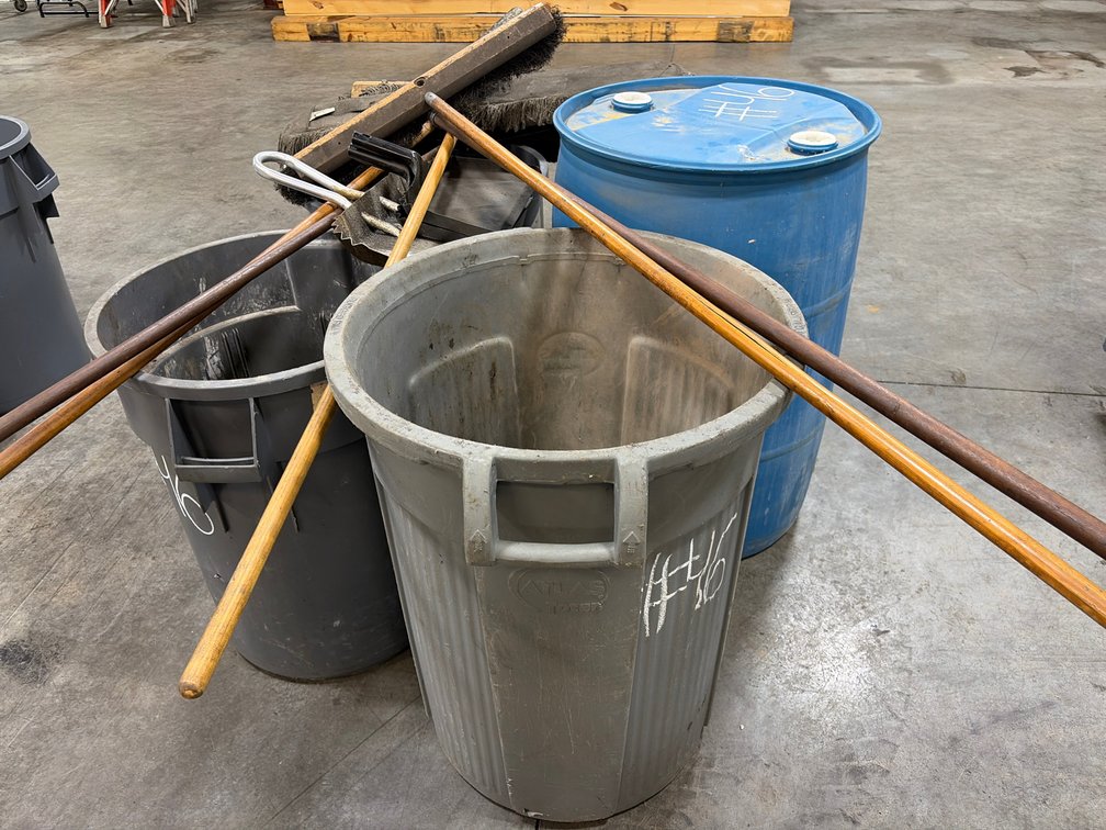 Trash cans and brooms