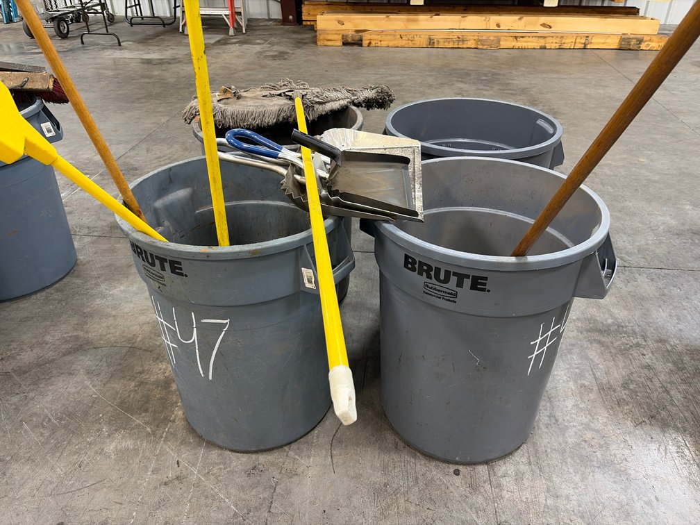 Trash cans and brooms