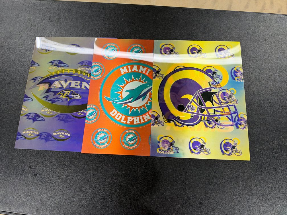 3 NFL teams holographic signs