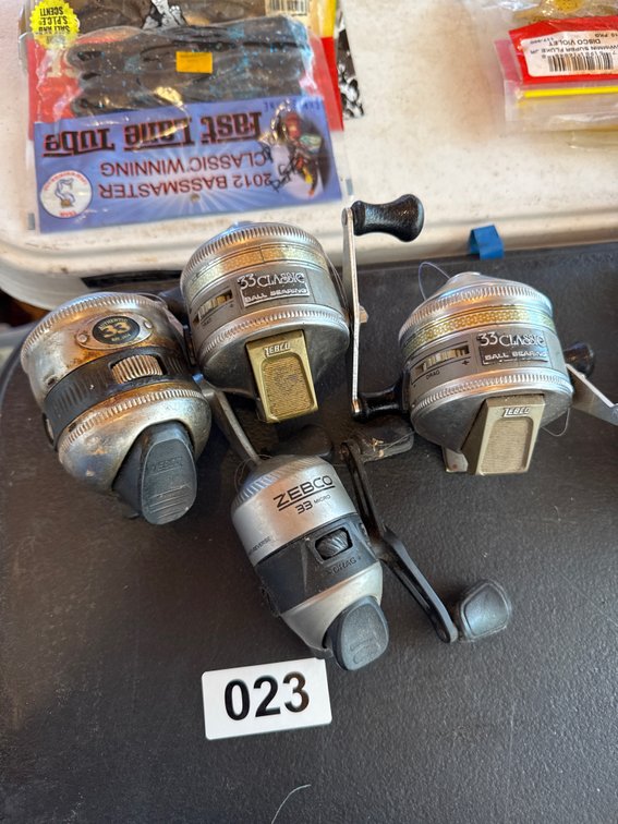 Four Zebco 33 reels