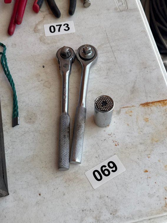 Two ratchets and gator grip socket