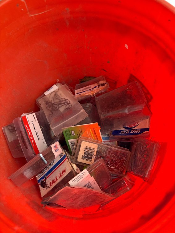 Bucket of fishing hooks