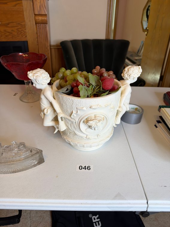 White pot with fruit
