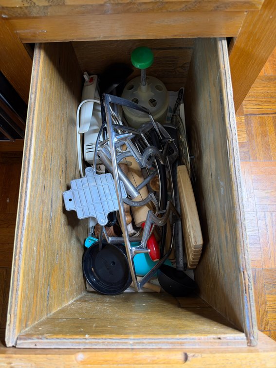 Misc kitchenware in bottom drawer