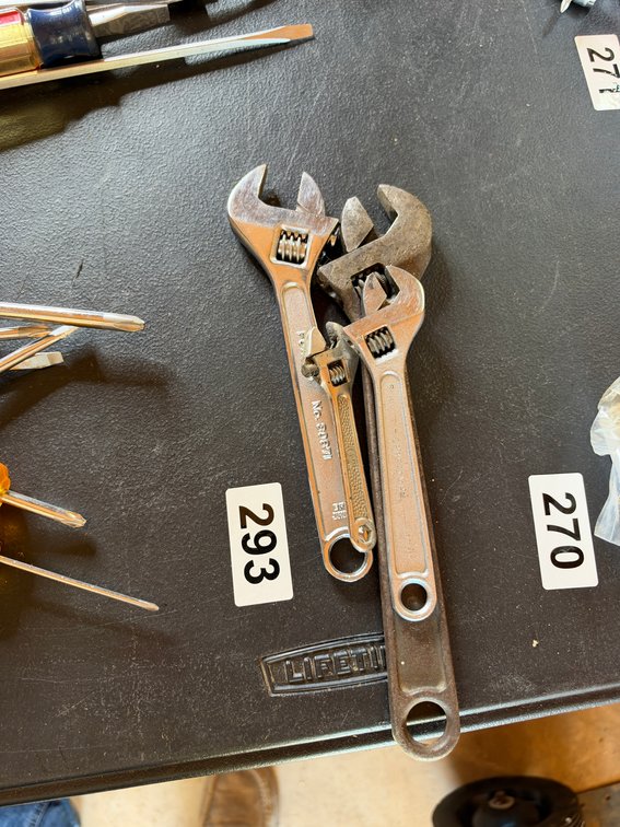 Four crescent wrenches