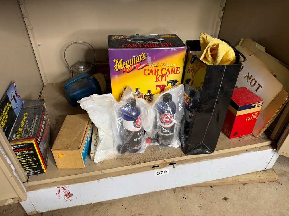 Bottom shelf, middle cabinet