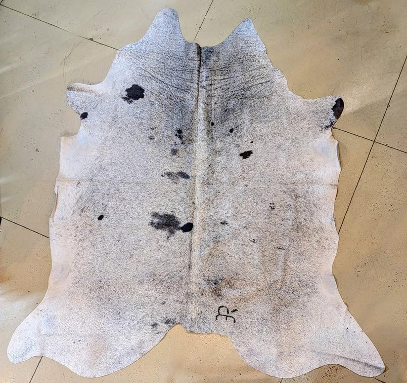 Branded Black & White Cowhide Rug - Blotter