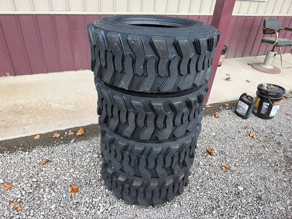 SET 12-16.5 SKIDSTEER TIRES