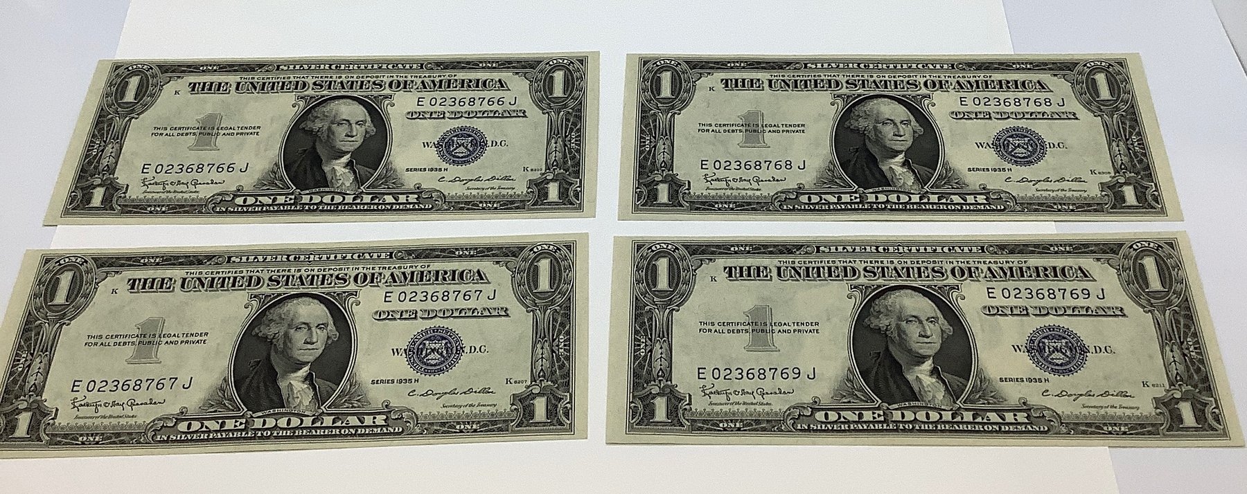 Four 1935 H $1 Silver Certificates -  Consecutive Serial Numbers