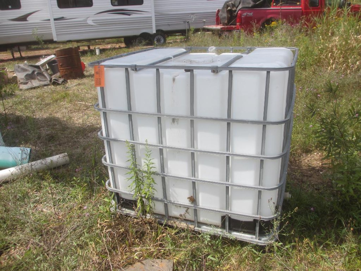 IBC Tote in Metal Cage