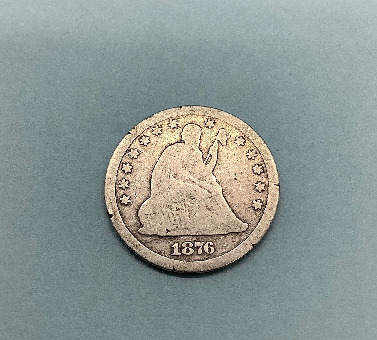 1876-CC Seated Liberty 25c