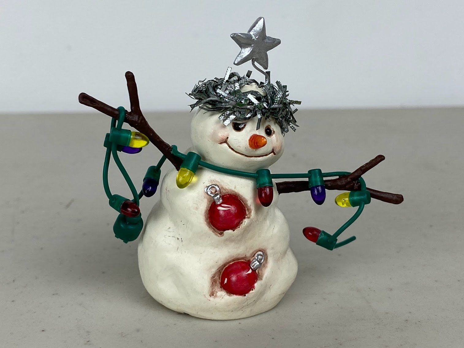 Hallmark- 2001- Jan Karon- Snowman with Christmas lights & Christmas Star on head with halo-No box